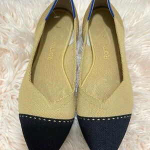 Rothy's Two-Tone Pointed Knit Flats in Tan and Black with Blue Trim